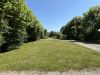 Vacances en famille au Lac de Paladru 22 Allée arborée du camping familial Détente et Clapotis en Isère