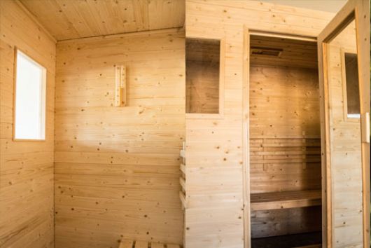 Sauna finlandais et espace bien-être du camping Détente et Clapotis - relaxation romantique au Lac de Paladru