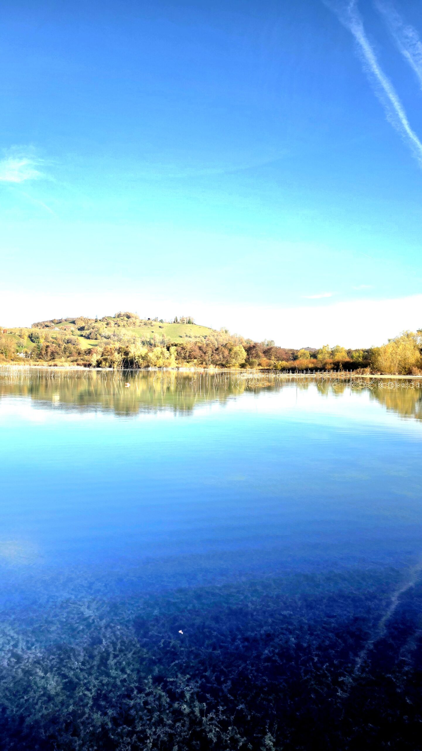 Senior holidays at Lake Paladru 3 Lac de Paladru in autumn from the campsite — peaceful setting for senior holidays in Isère